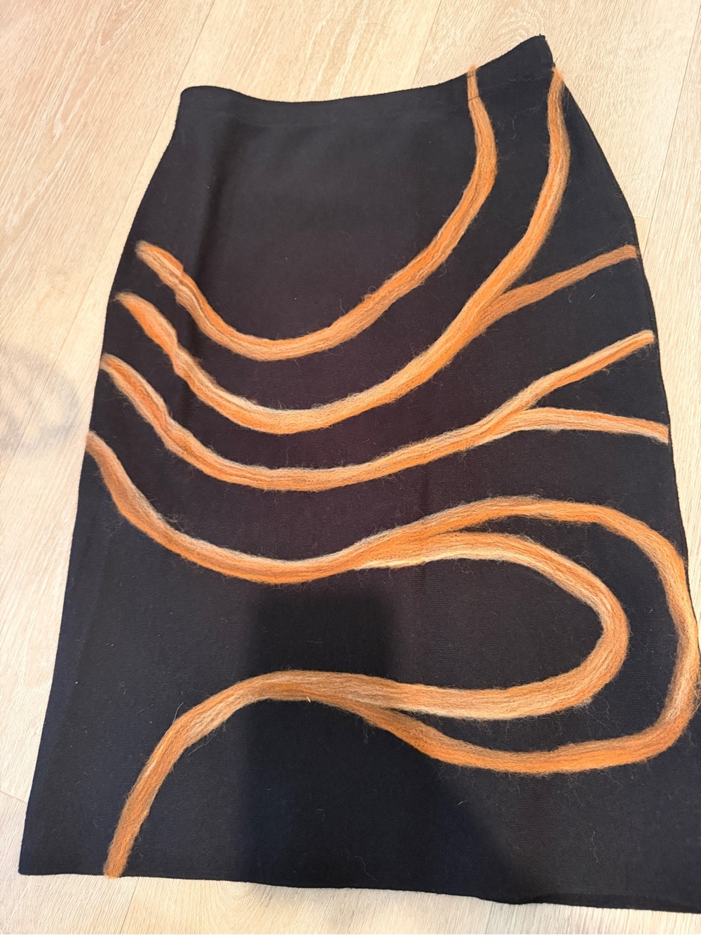 Black Pencil Skirt with Orange Wave Detail